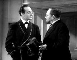 Rathbone and Lionel Atwill, from "The Hound of the Baskervilles" (c) 20th Century Fox